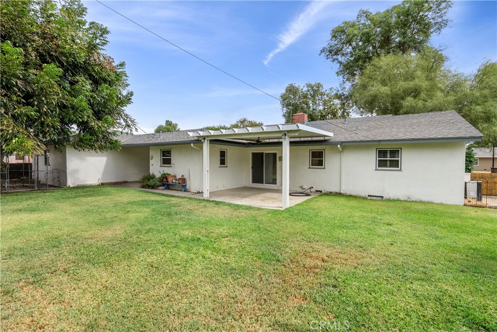 4669 Edgewood Place Riverside, CA 92506 - Photo 23 of 26 a view of a yard with a house