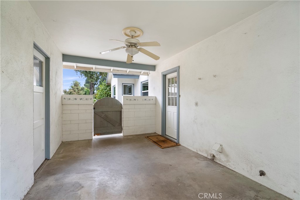 4669 Edgewood Place Riverside, CA 92506 - Photo 25 of 26 a view of a livingroom with wooden floor and windows