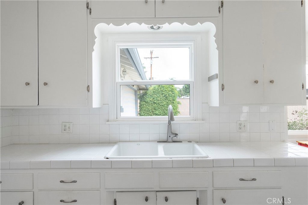 4669 Edgewood Place Riverside, CA 92506 - Photo 6 of 26 a view of a kitchen sink and window