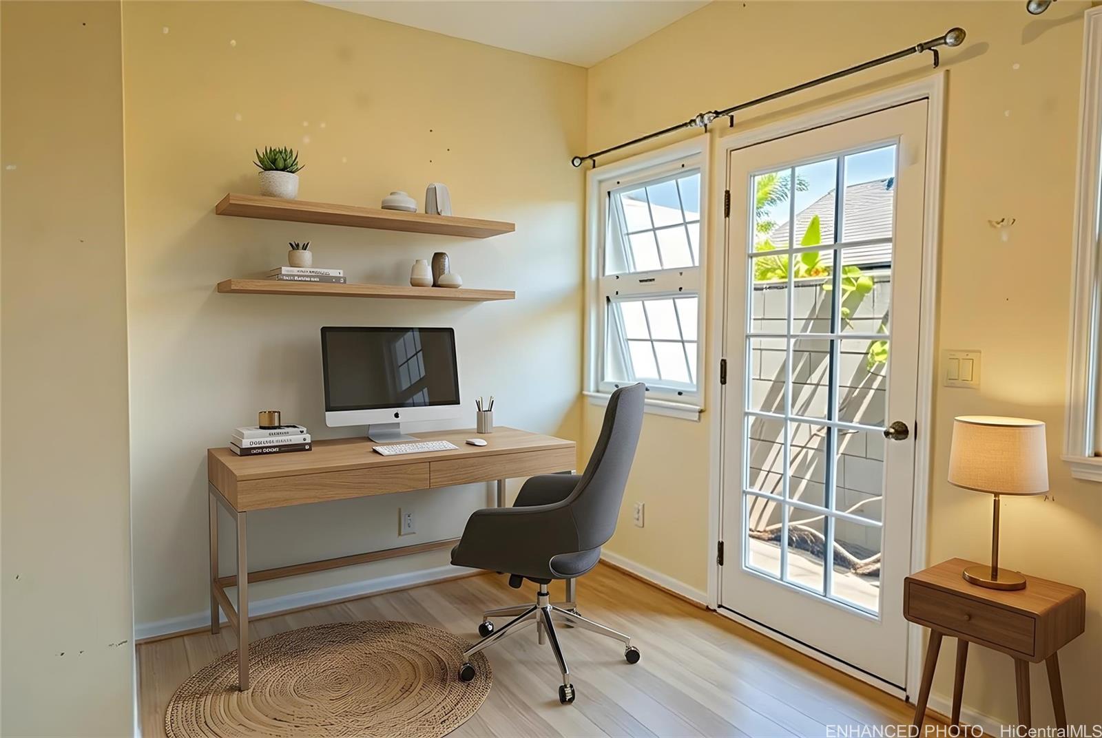 4026 Harding Avenue Honolulu, HI 96816 - Photo 5 of 18 a view of a workspace with furniture and a window