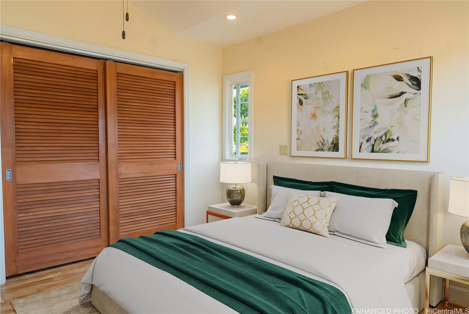 4026 Harding Avenue Honolulu, HI 96816 - Photo 7 of 18 a bedroom with a bed and a painting on the wall