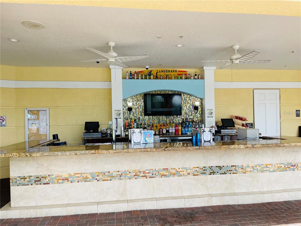 5049 Shoreway Loop, Unit 40601 Orlando, FL 32819 - Photo 21 of 28 a view of a hall with the floor and living room