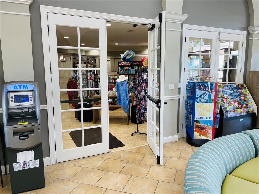 5049 Shoreway Loop, Unit 40601 Orlando, FL 32819 - Photo 26 of 28 a view of living room with furniture and window
