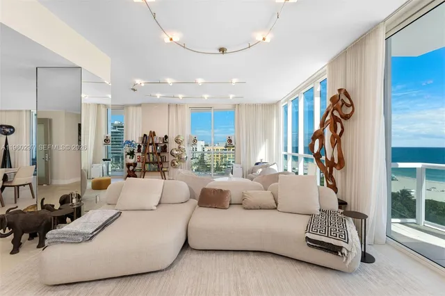 a living room with furniture and white walls