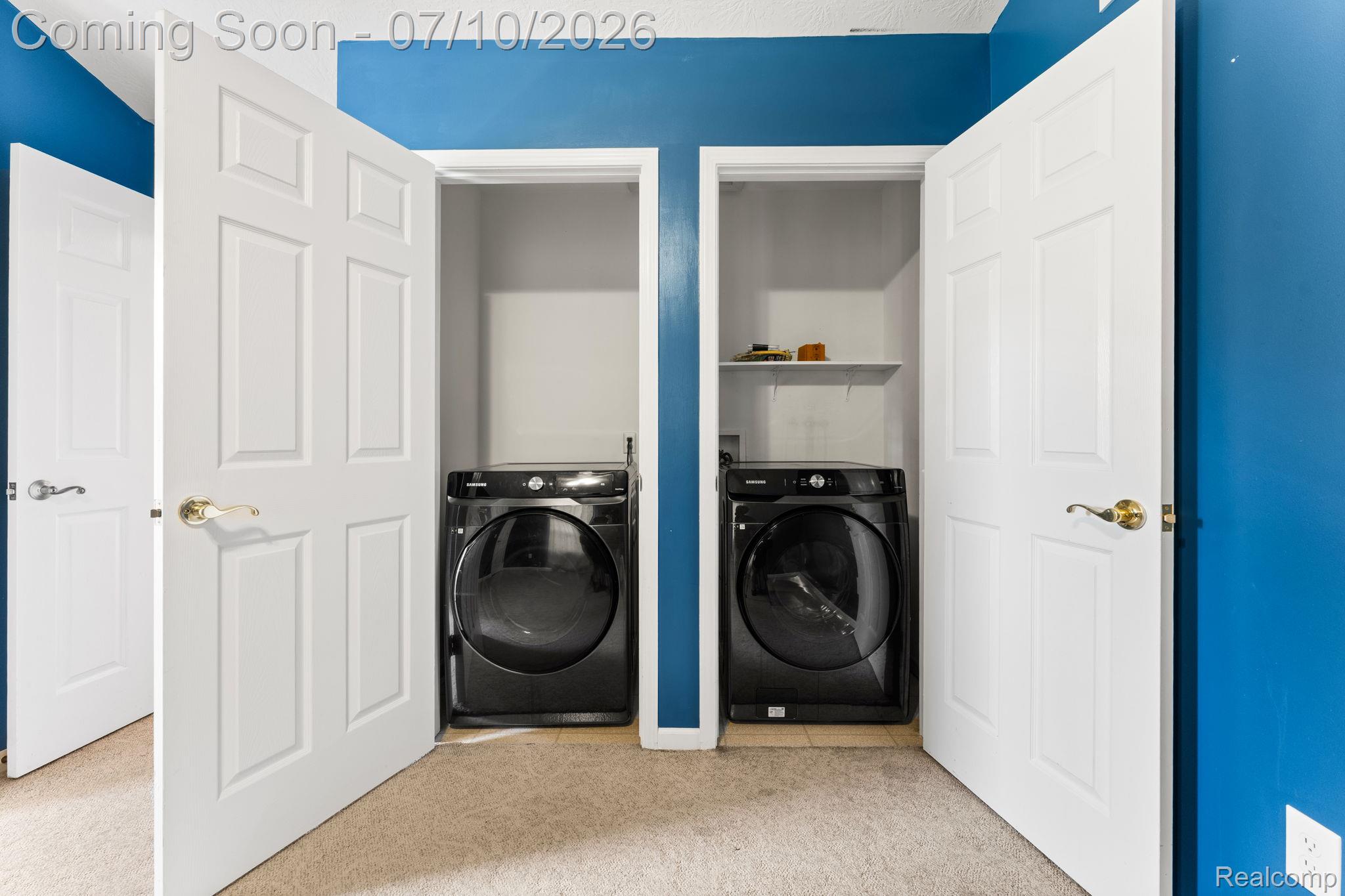 3144 North Nicholson Road Fowlerville, MI 48836 - Photo 56 of 70 Dedicated laundry area featuring dual appliances and built-in shelving