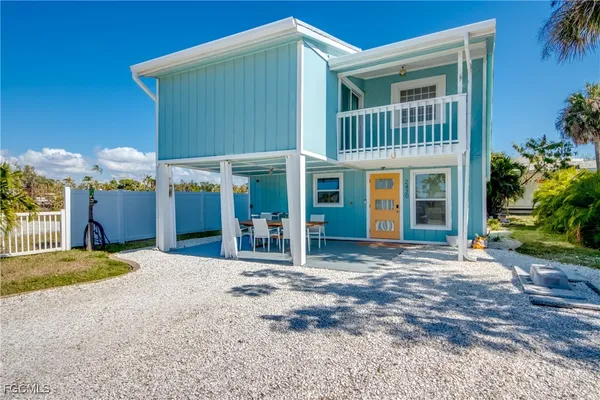 a view of a house with a patio
