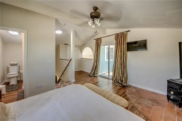 a room with gym equipment and a mirror