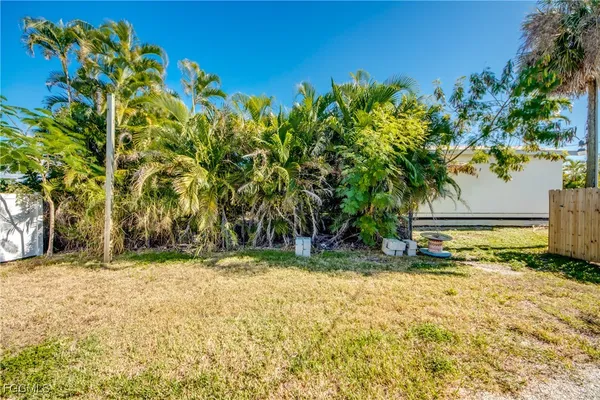 a view of swimming pool with a yard