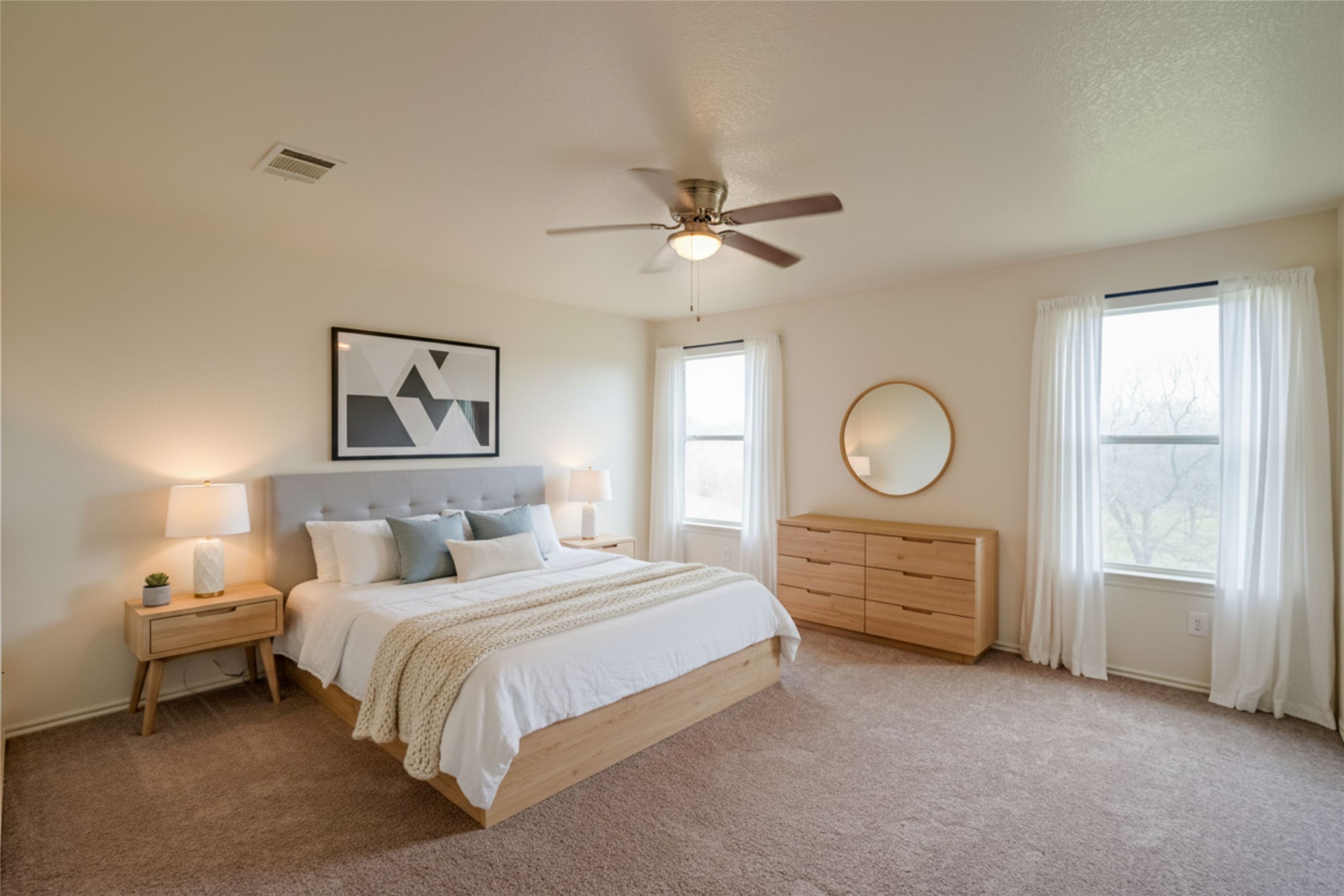 714 Lavaca Loop Elgin, TX 78621 - Photo 11 of 38 Bedroom featuring carpet flooring, multiple windows, and a ceiling fan