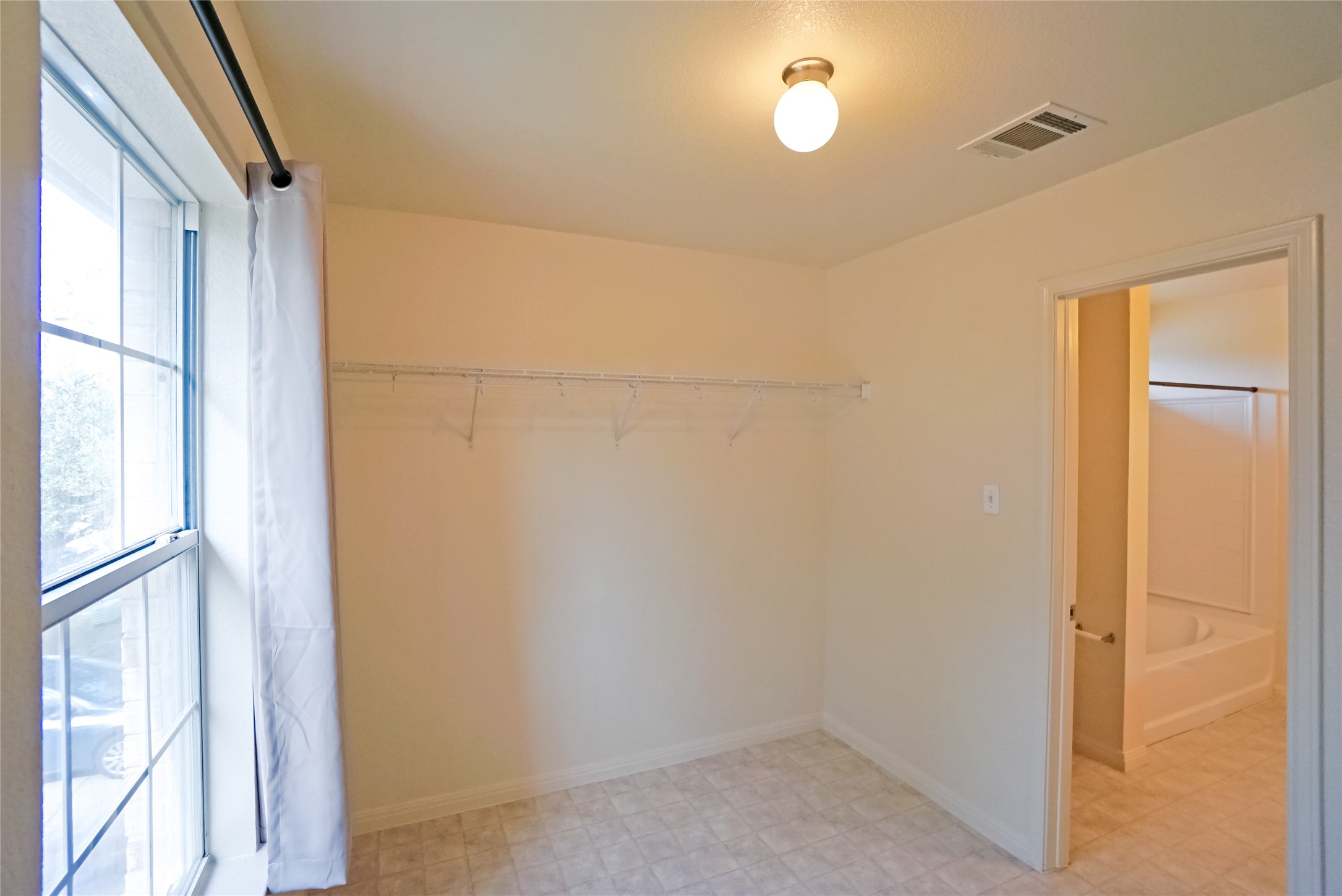 714 Lavaca Loop Elgin, TX 78621 - Photo 33 of 38 Walk in closet featuring light floors