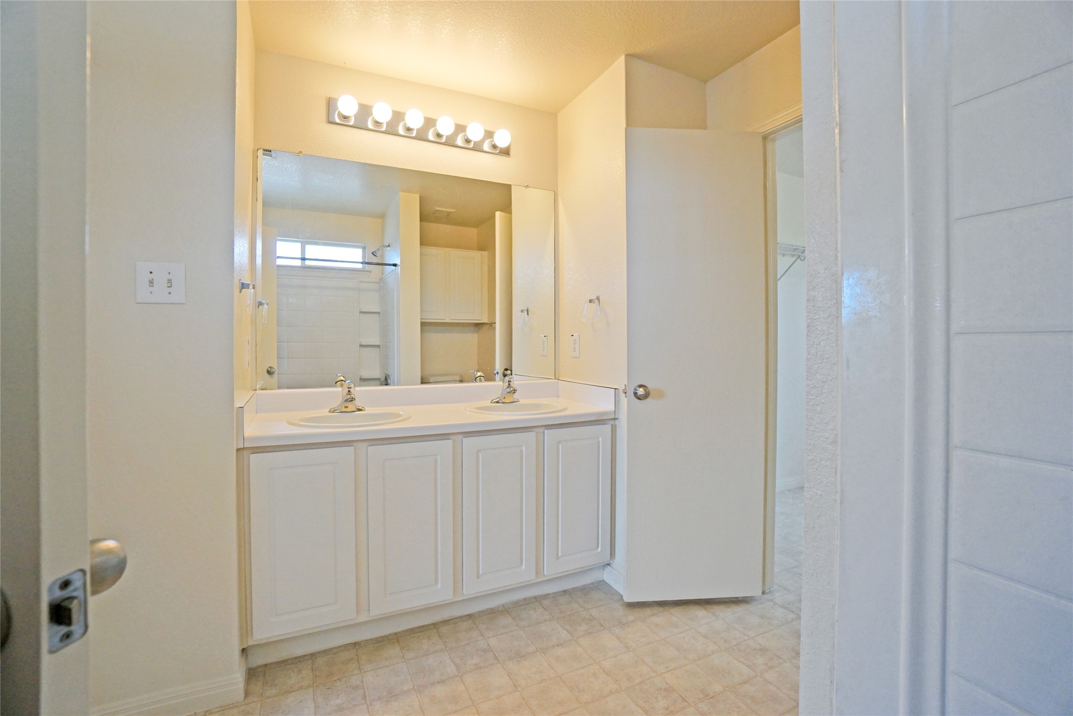 714 Lavaca Loop Elgin, TX 78621 - Photo 34 of 38 Bathroom featuring double vanity and light floors