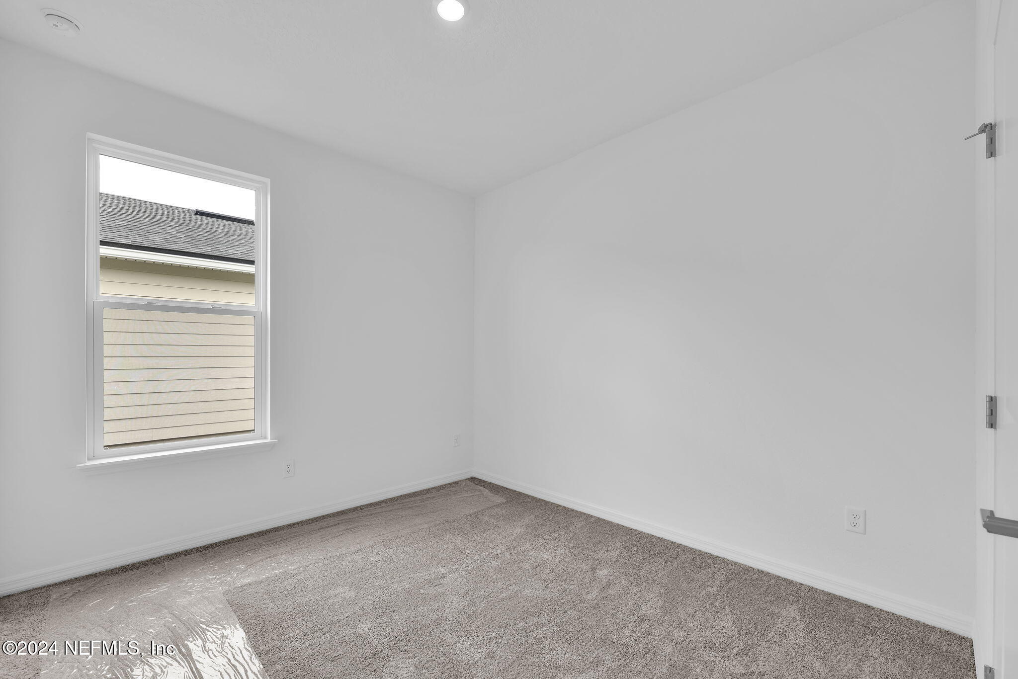 46 Fairlake Circle St. Augustine, FL 32092 - Photo 21 of 45 an empty room with a window