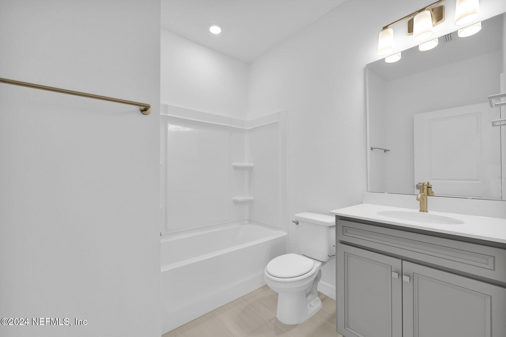 46 Fairlake Circle St. Augustine, FL 32092 - Photo 22 of 45 a bathroom with a sink a toilet and shower