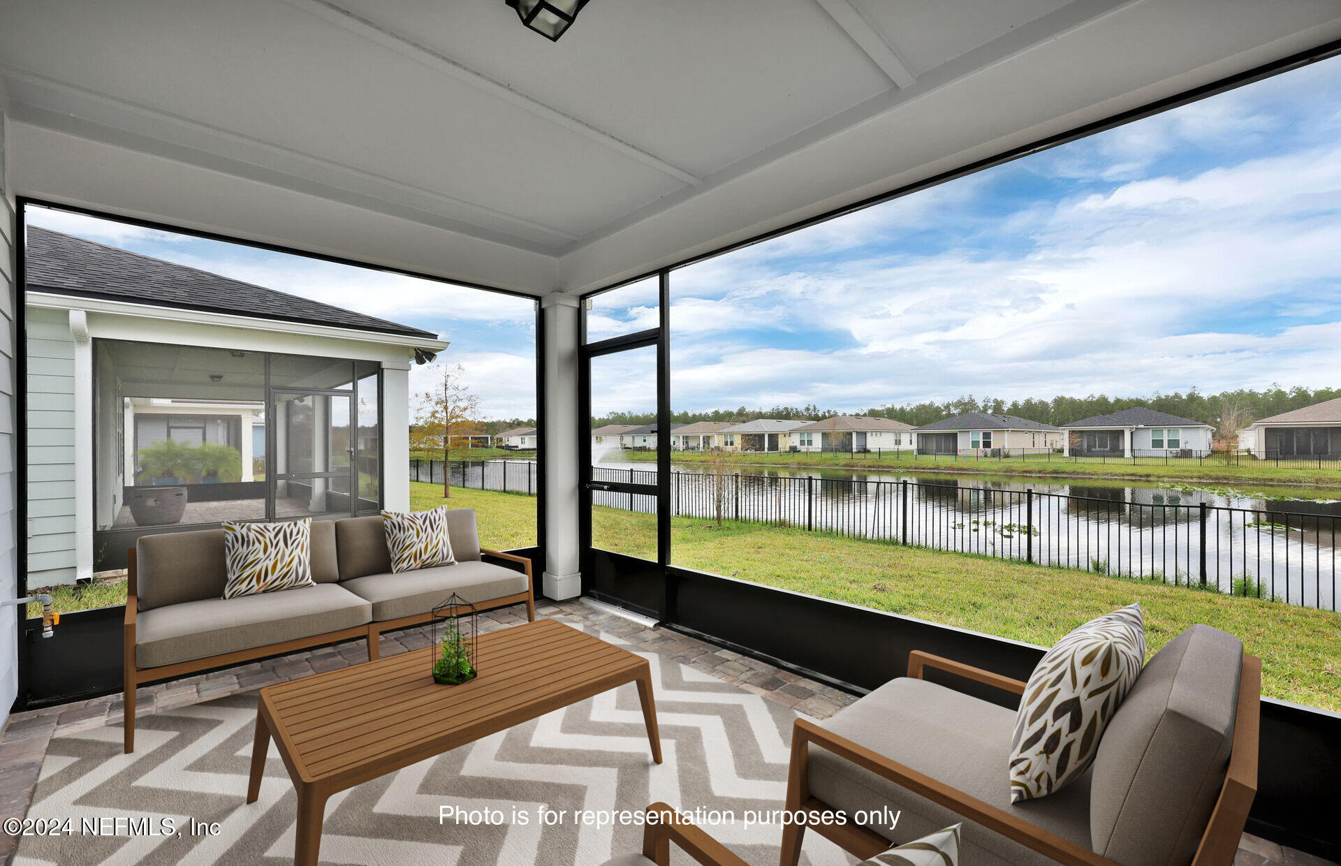 46 Fairlake Circle St. Augustine, FL 32092 - Photo 25 of 45 a view of a patio with couches chairs dining table and chairs