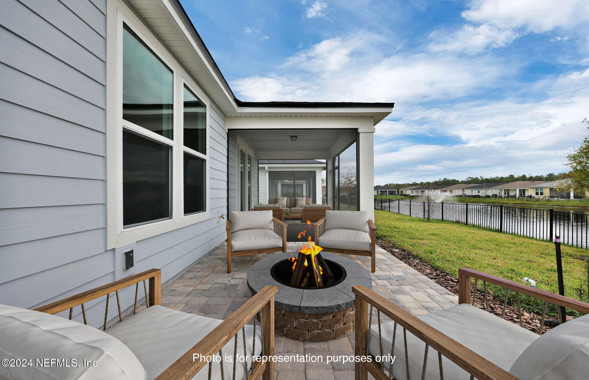 46 Fairlake Circle St. Augustine, FL 32092 - Photo 28 of 45 a balcony with furniture and a garden