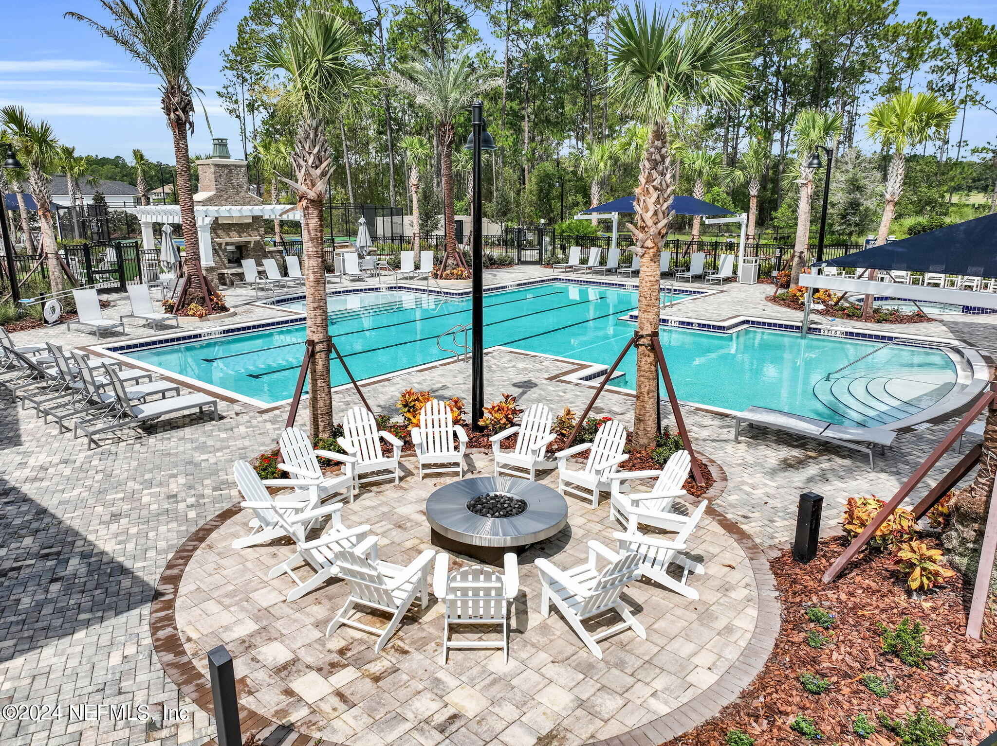 46 Fairlake Circle St. Augustine, FL 32092 - Photo 36 of 45 a view of a swimming pool with a patio