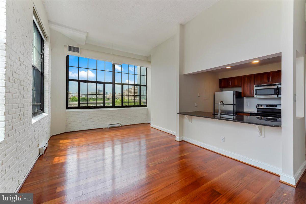 2429 Locust Street, Unit 306 Philadelphia, PA 19103 - Photo 7 of 37 Open living/kitchen