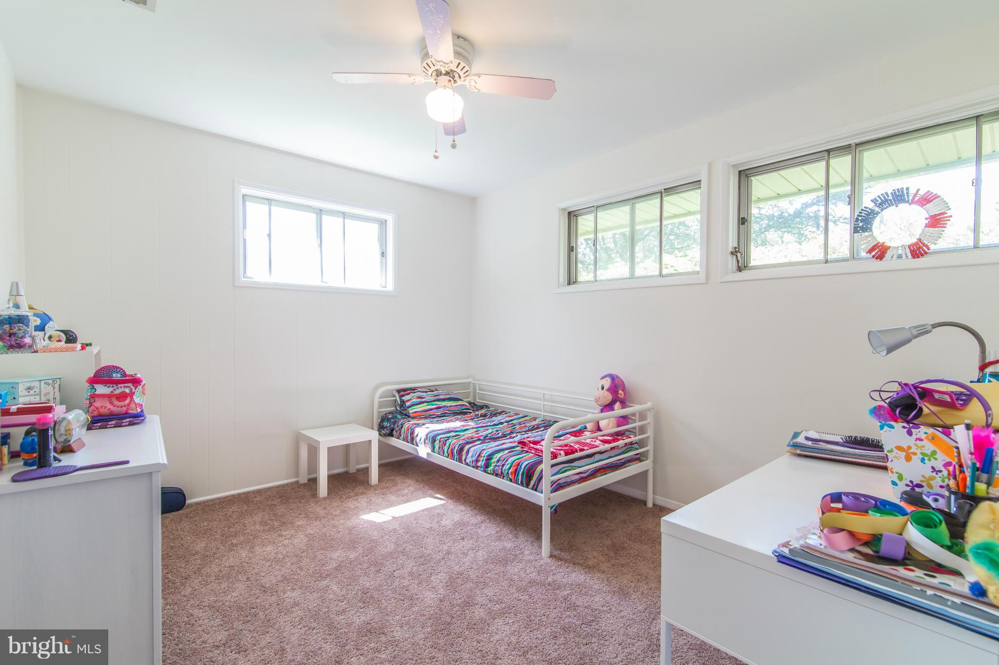 7407 Inzer Street Springfield, VA 22151 - Photo 17 of 29 a children room with toys and a chandelier