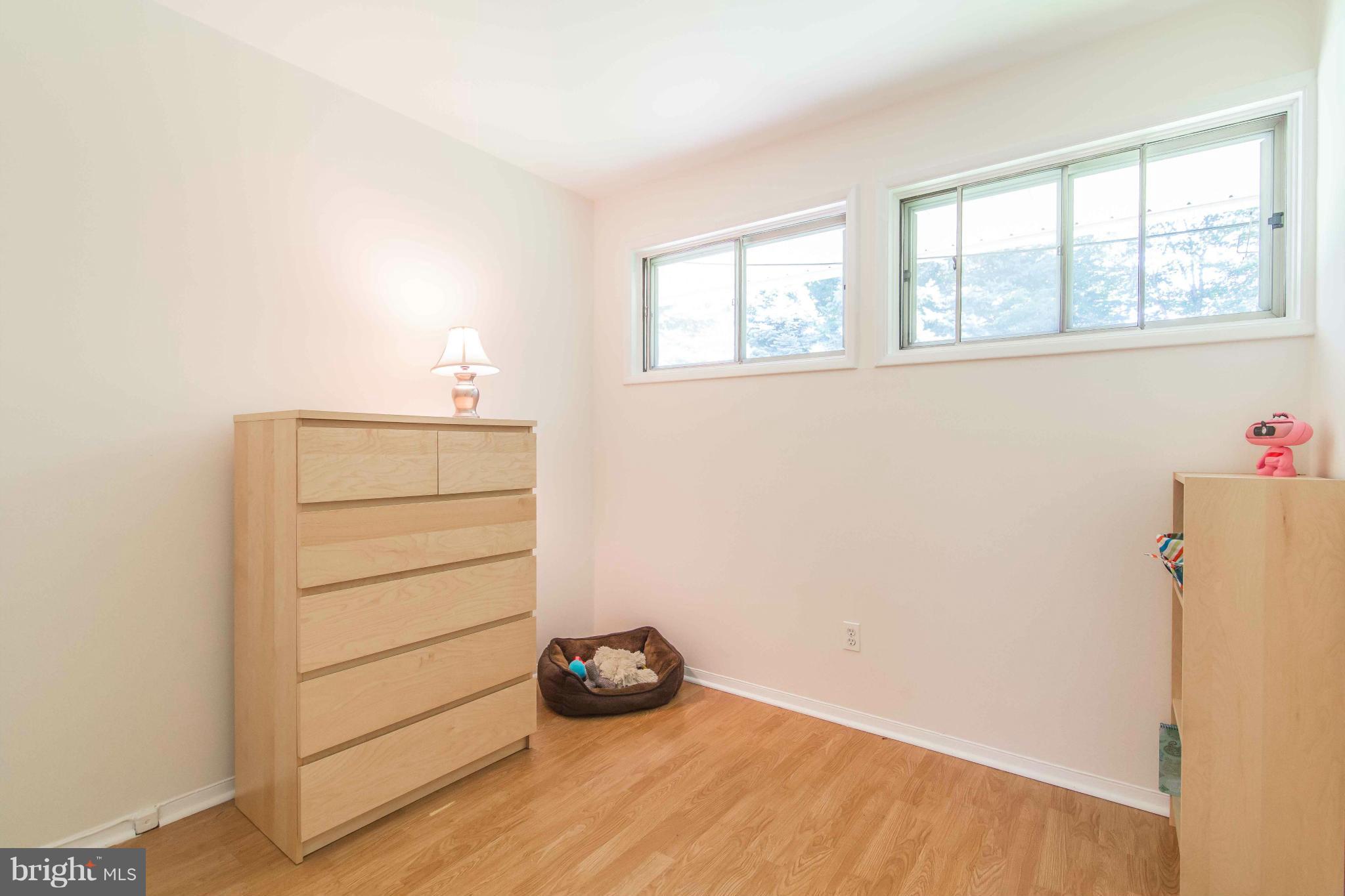 7407 Inzer Street Springfield, VA 22151 - Photo 19 of 29 a view of an empty room with a window