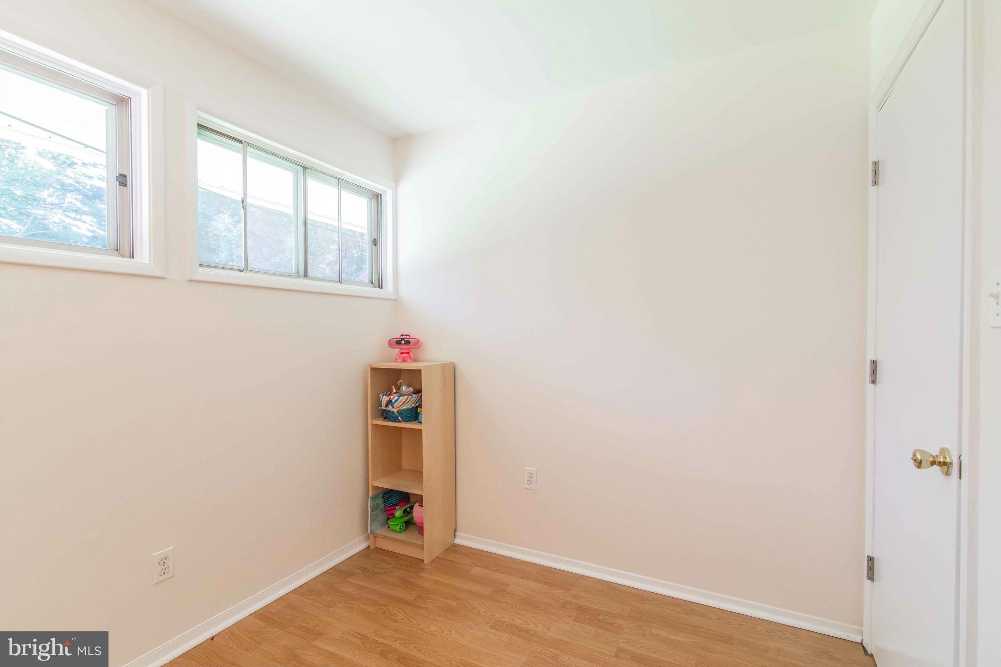 7407 Inzer Street Springfield, VA 22151 - Photo 20 of 29 wooden floor in an empty room
