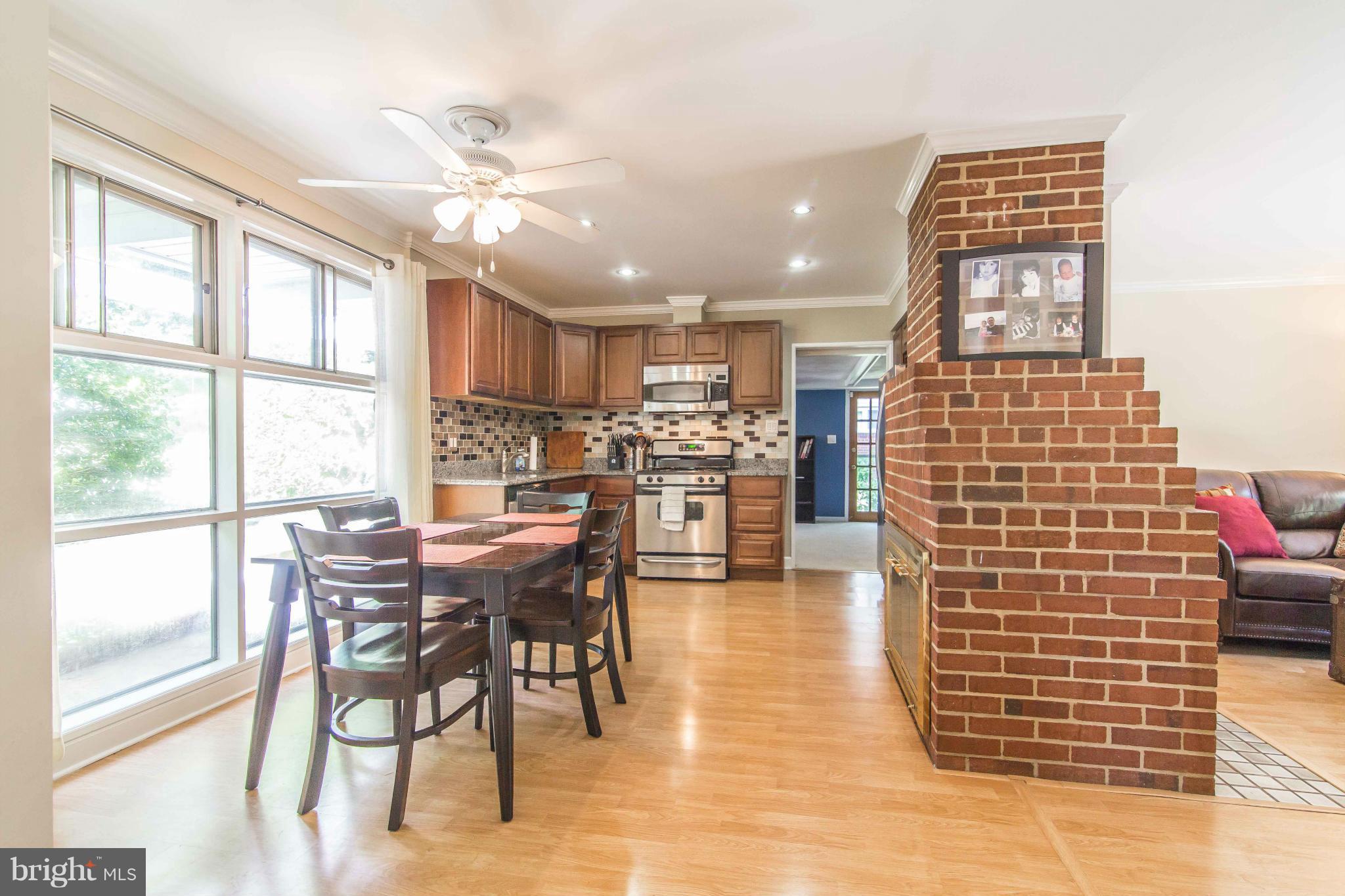 7407 Inzer Street Springfield, VA 22151 - Photo 3 of 29 a view of a dining room with furniture
