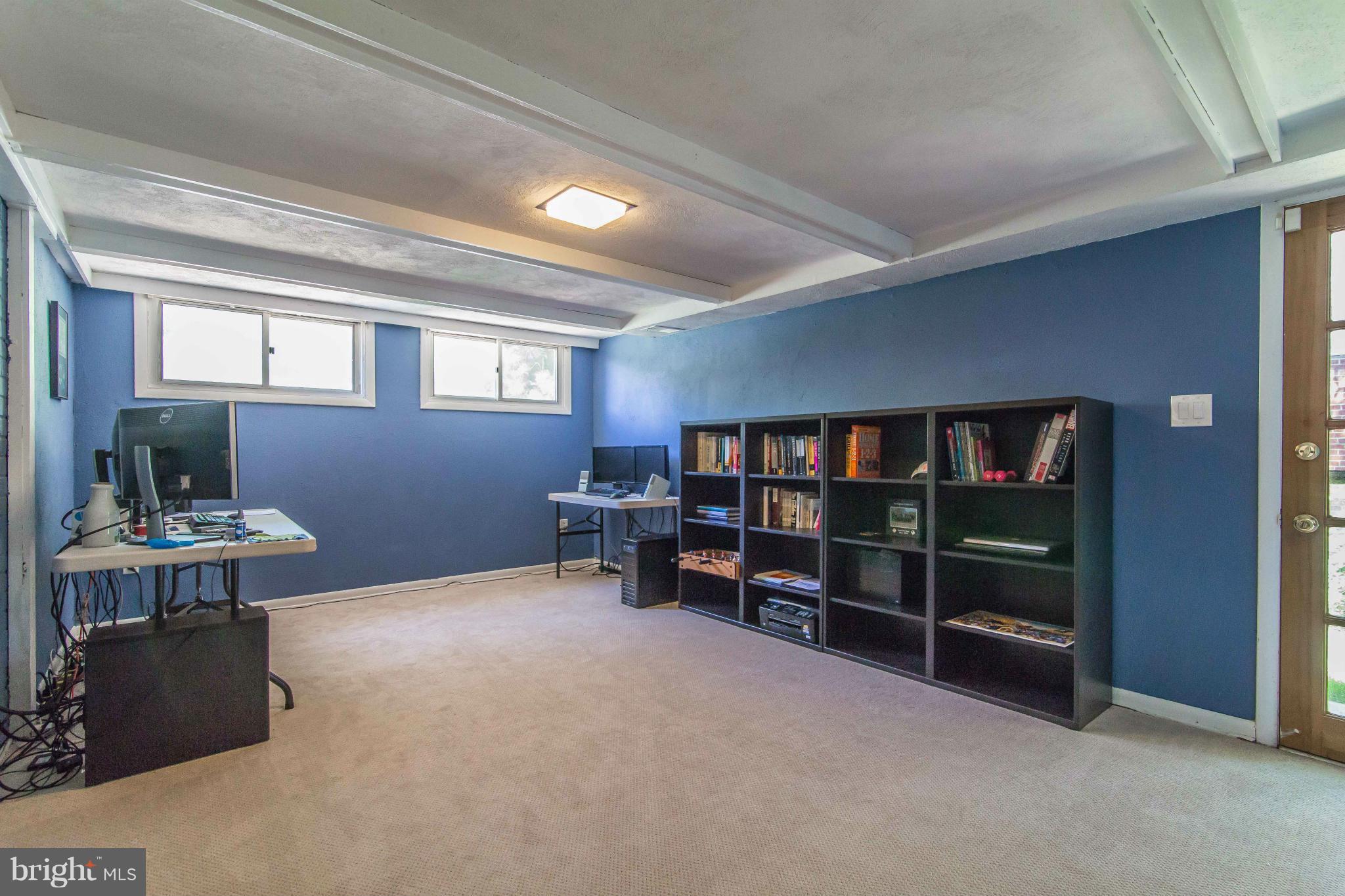 7407 Inzer Street Springfield, VA 22151 - Photo 23 of 29 a view of living room with furniture and window