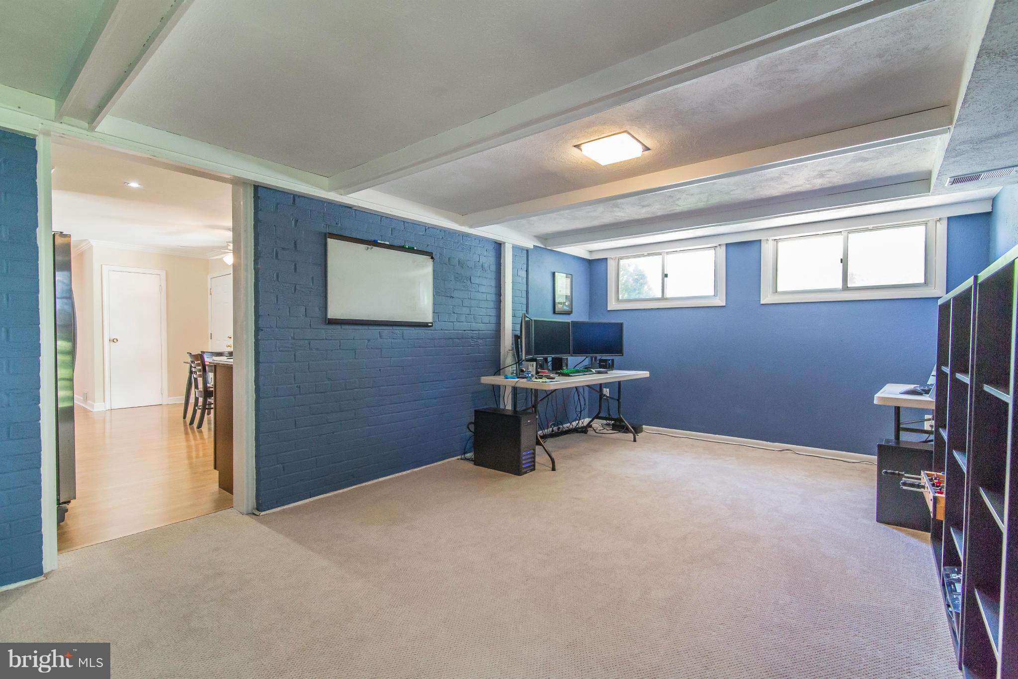 7407 Inzer Street Springfield, VA 22151 - Photo 24 of 29 a room with furniture and a window