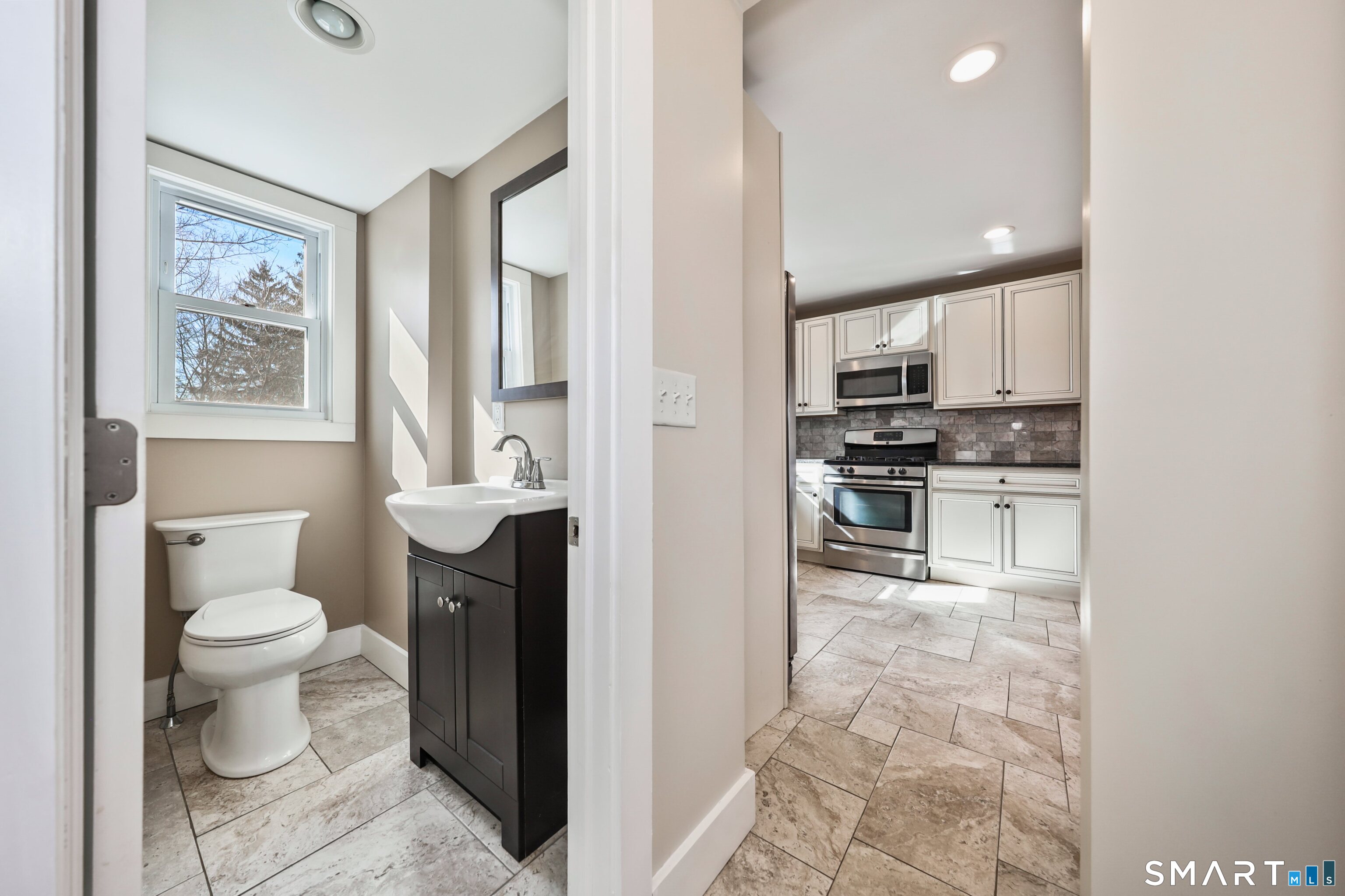 116 Hillside Avenue Torrington, CT 06790 - Photo 18 of 40 a bathroom with a sink toilet and shower