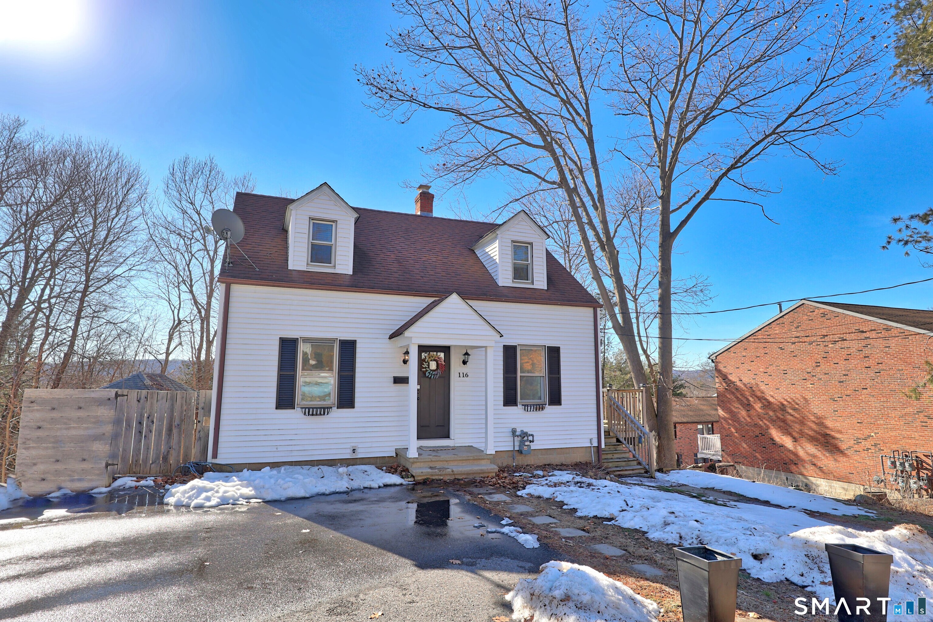 116 Hillside Avenue Torrington, CT 06790 - Photo 2 of 40 a front view of a house with garden