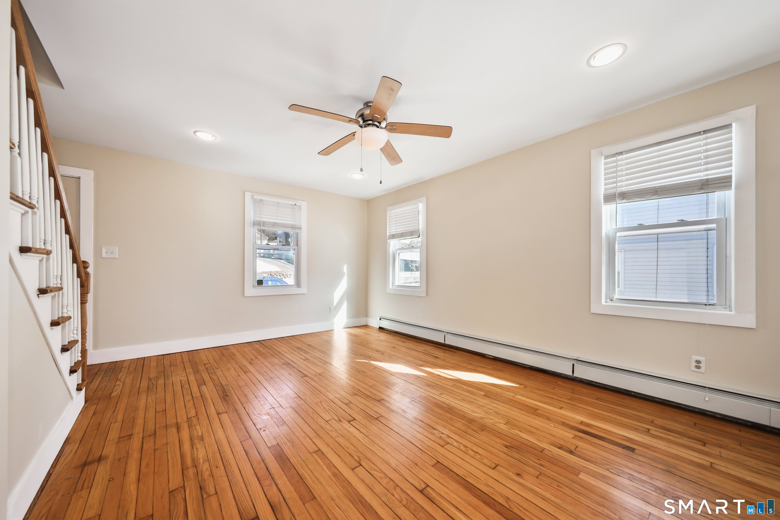 116 Hillside Avenue Torrington, CT 06790 - Photo 23 of 40 wooden floor in an empty room with a window