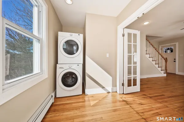 a view of a storage & utility room with washer and dryer