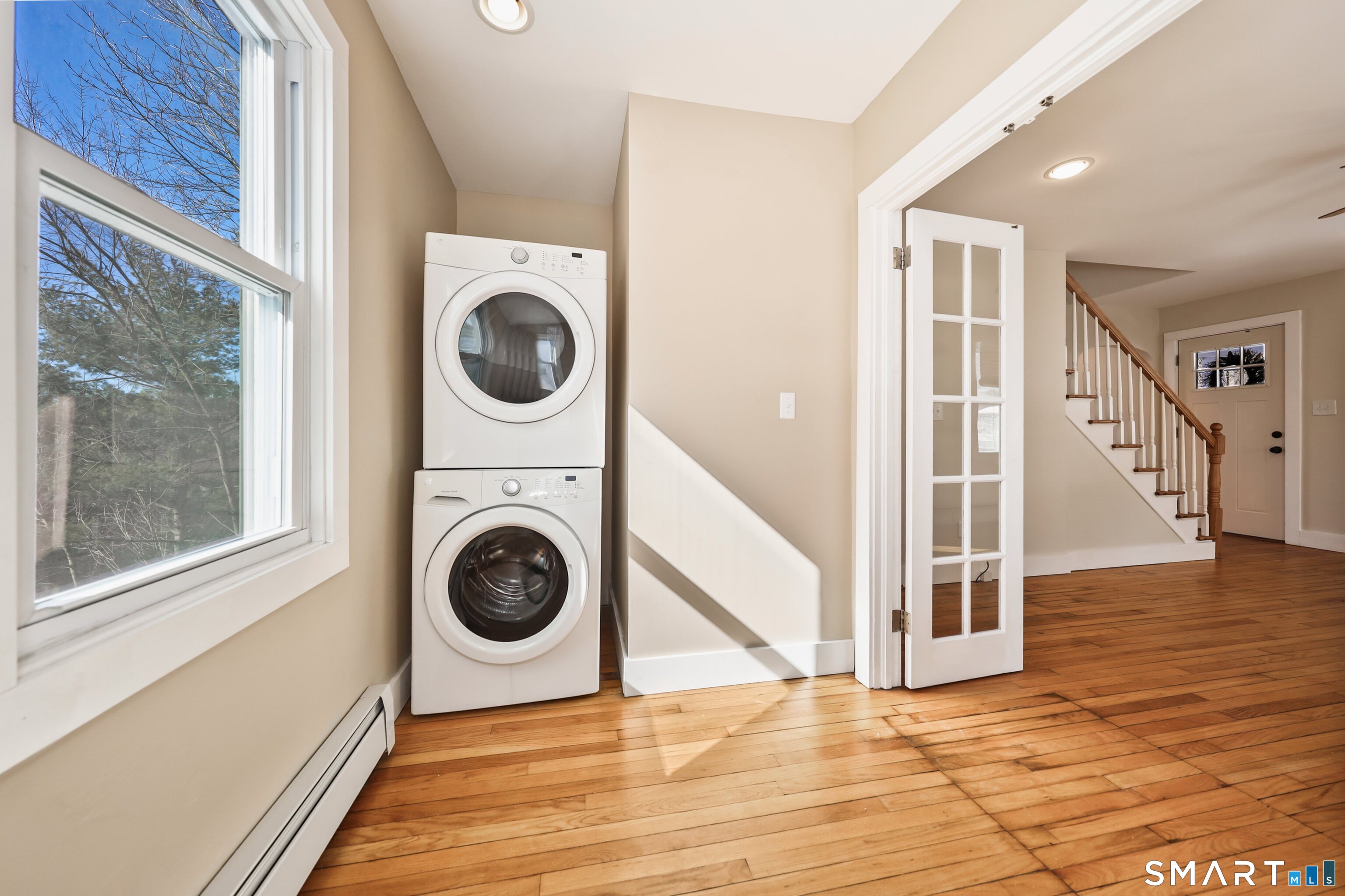 116 Hillside Avenue Torrington, CT 06790 - Photo 25 of 40 a view of a storage & utility room with washer and dryer