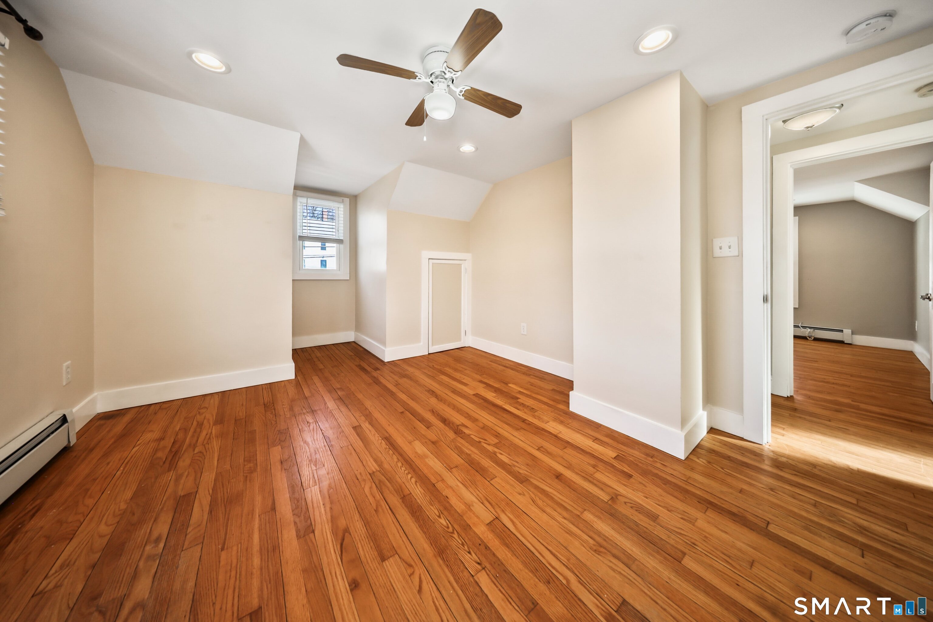 116 Hillside Avenue Torrington, CT 06790 - Photo 29 of 40 a view of empty room with wooden floor