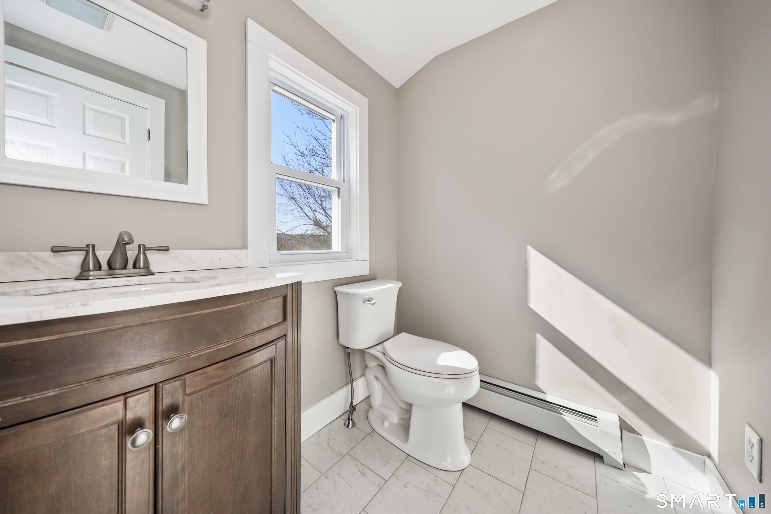 116 Hillside Avenue Torrington, CT 06790 - Photo 35 of 40 a bathroom with a sink toilet and a mirror