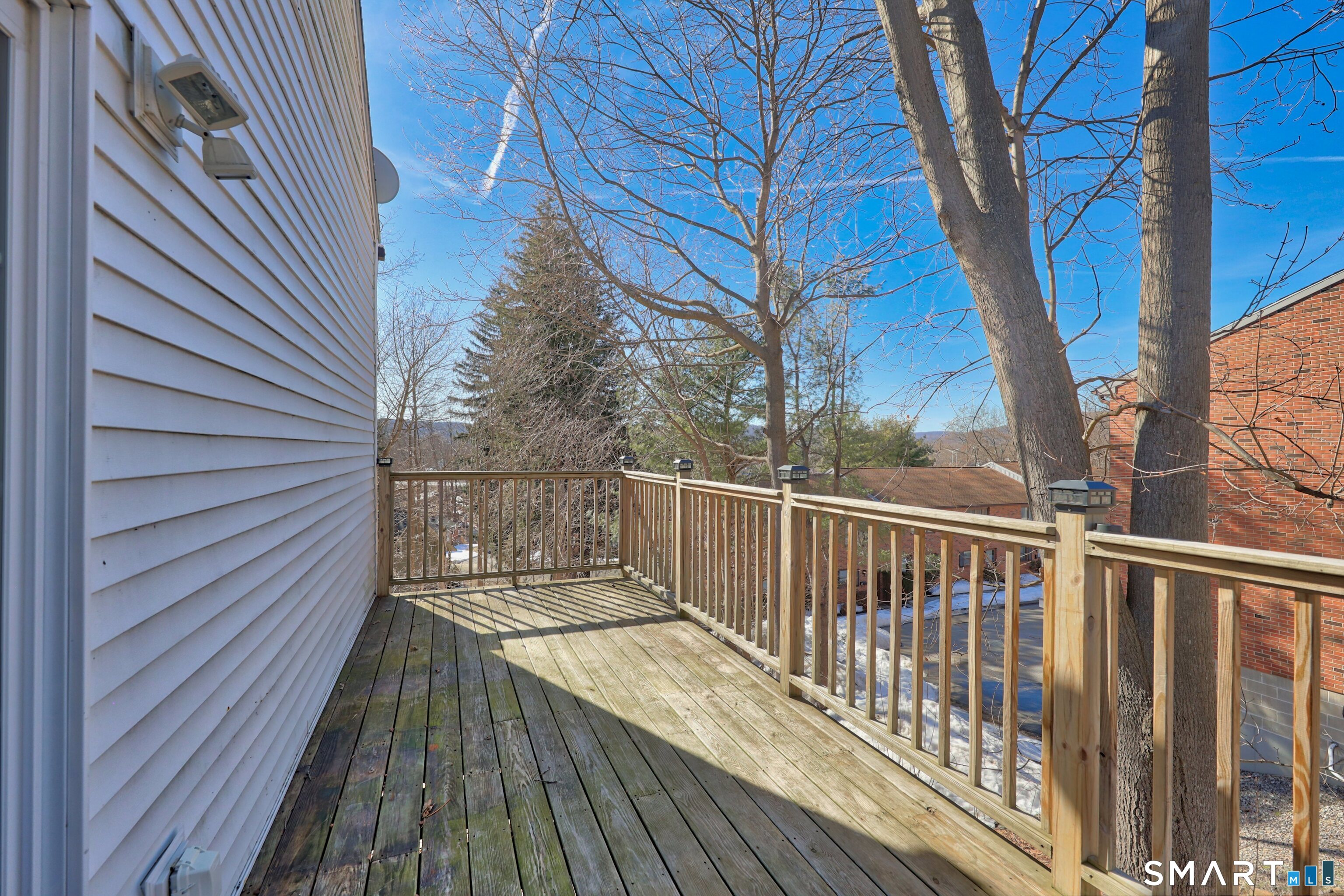 116 Hillside Avenue Torrington, CT 06790 - Photo 36 of 40 a view of balcony with wooden floor and fence
