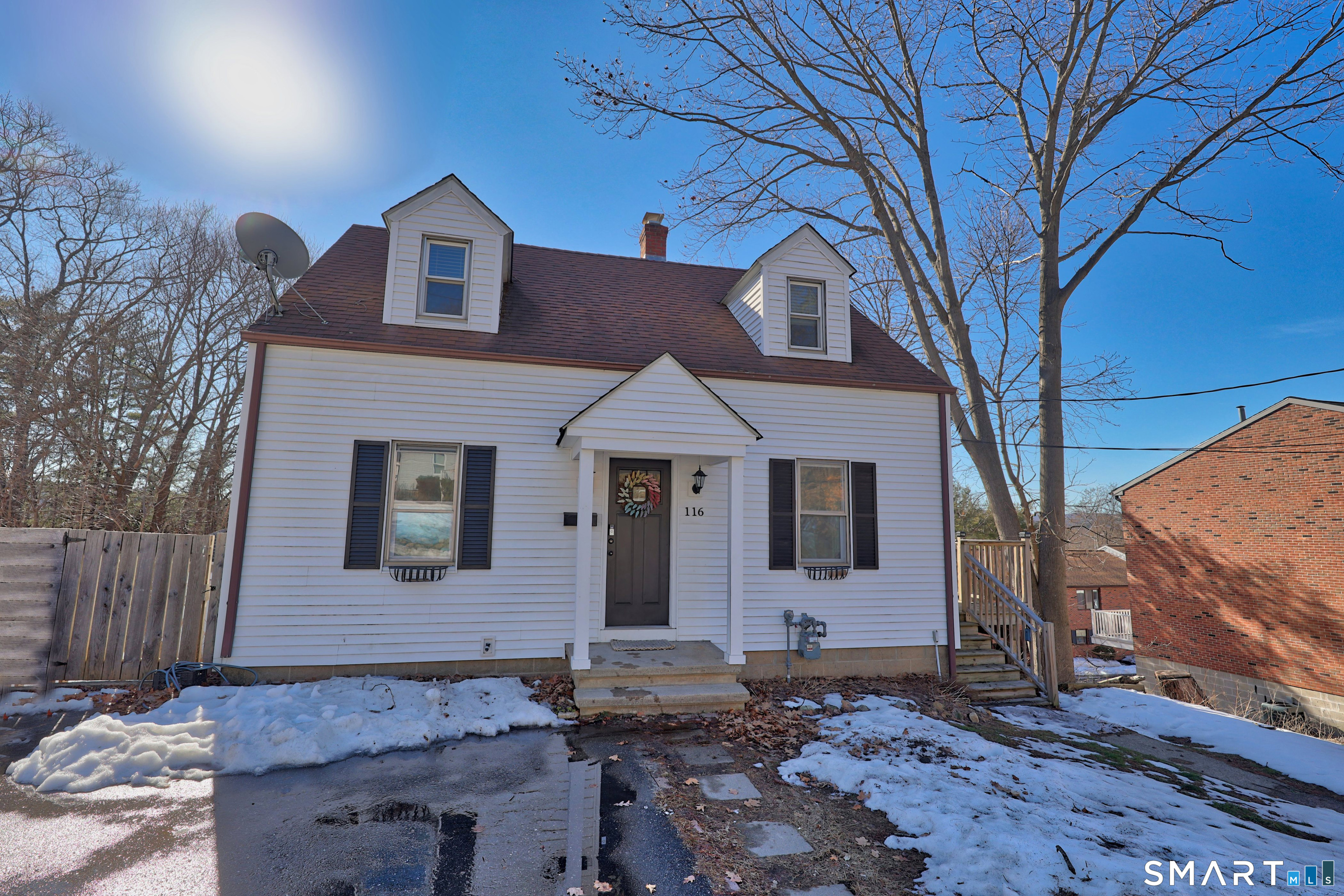 116 Hillside Avenue Torrington, CT 06790 - Photo 4 of 40 a front view of a house with garden