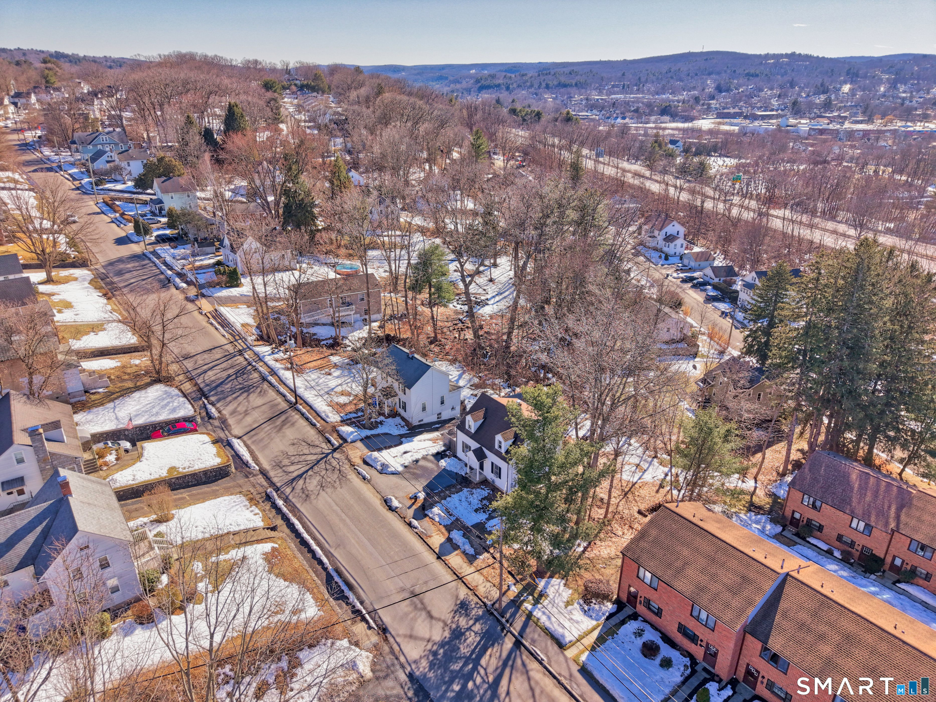 116 Hillside Avenue Torrington, CT 06790 - Photo 7 of 40 an aerial view of residential houses and city view