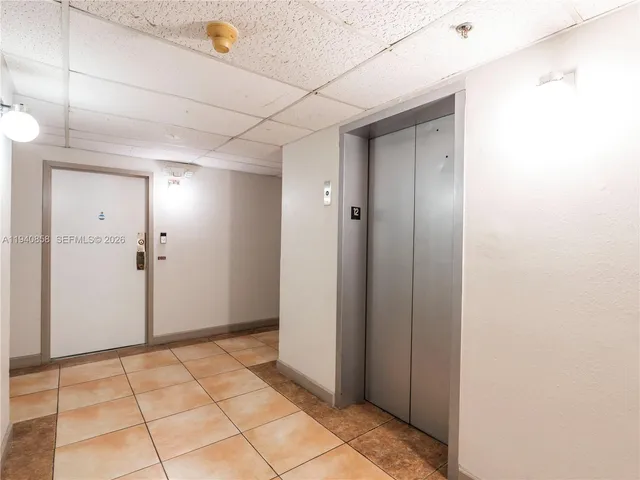 a view of storage and utility room with washer and dryer
