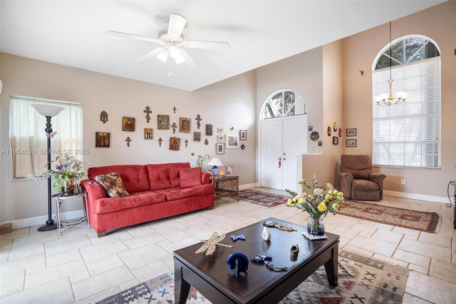 13930 Oak Ridge Drive Davie, FL 33325 - Photo 22 of 54 a living room with furniture and painting on the wall