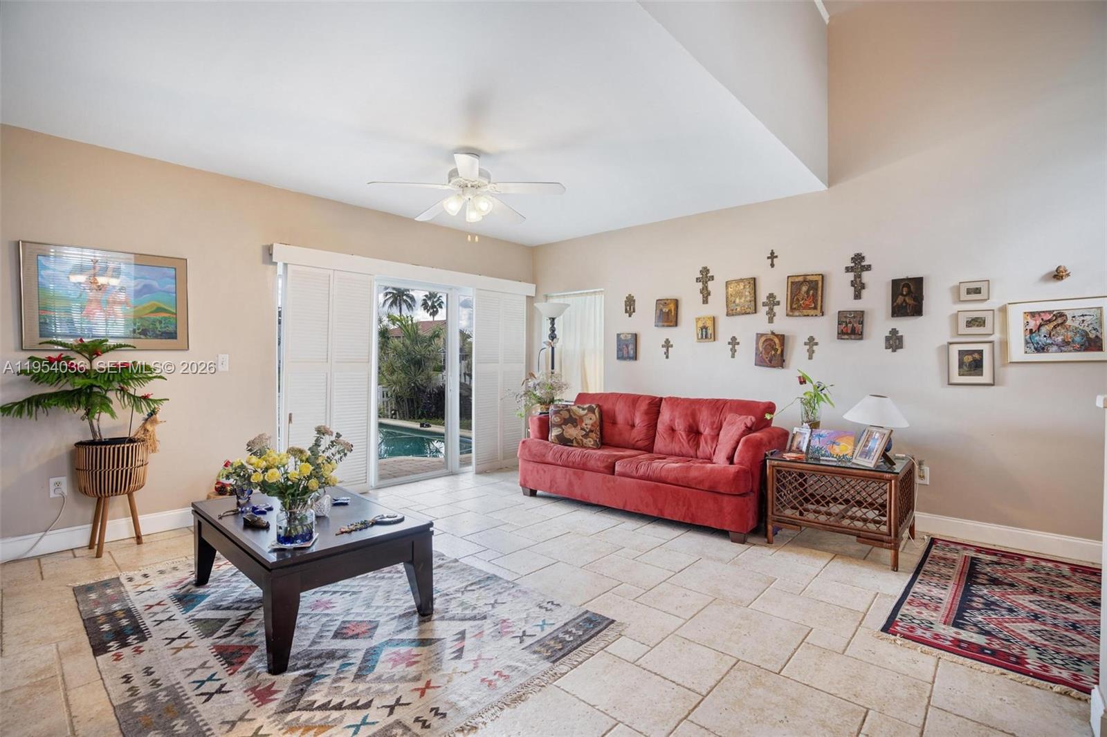 13930 Oak Ridge Drive Davie, FL 33325 - Photo 23 of 54 a living room with furniture and a potted plant