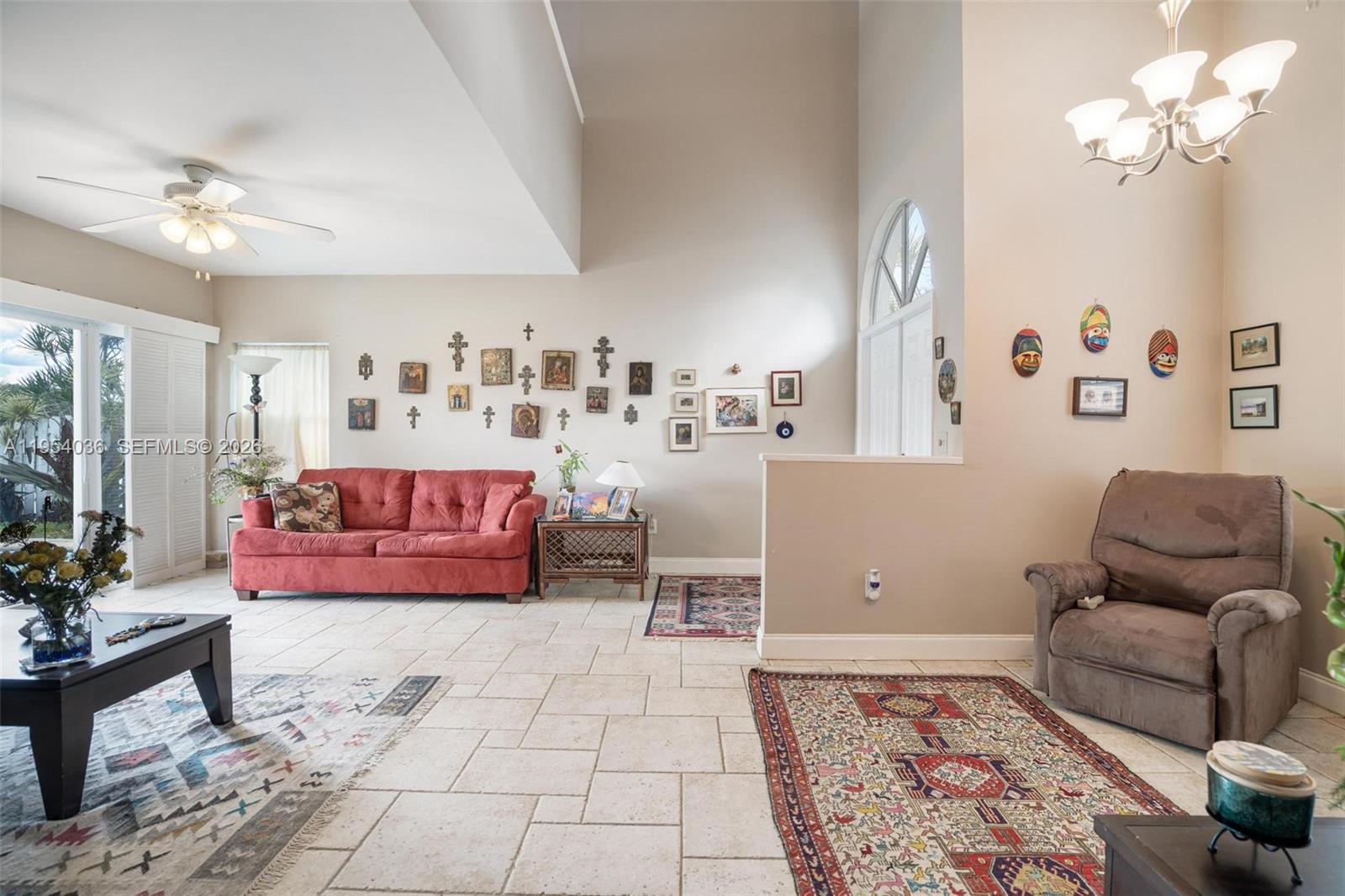 13930 Oak Ridge Drive Davie, FL 33325 - Photo 25 of 54 a bedroom with furniture and a rug