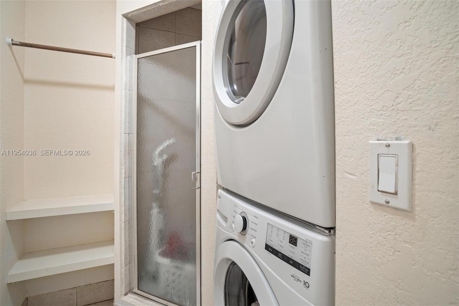 13930 Oak Ridge Drive Davie, FL 33325 - Photo 39 of 54 a utility room with dryer and washer