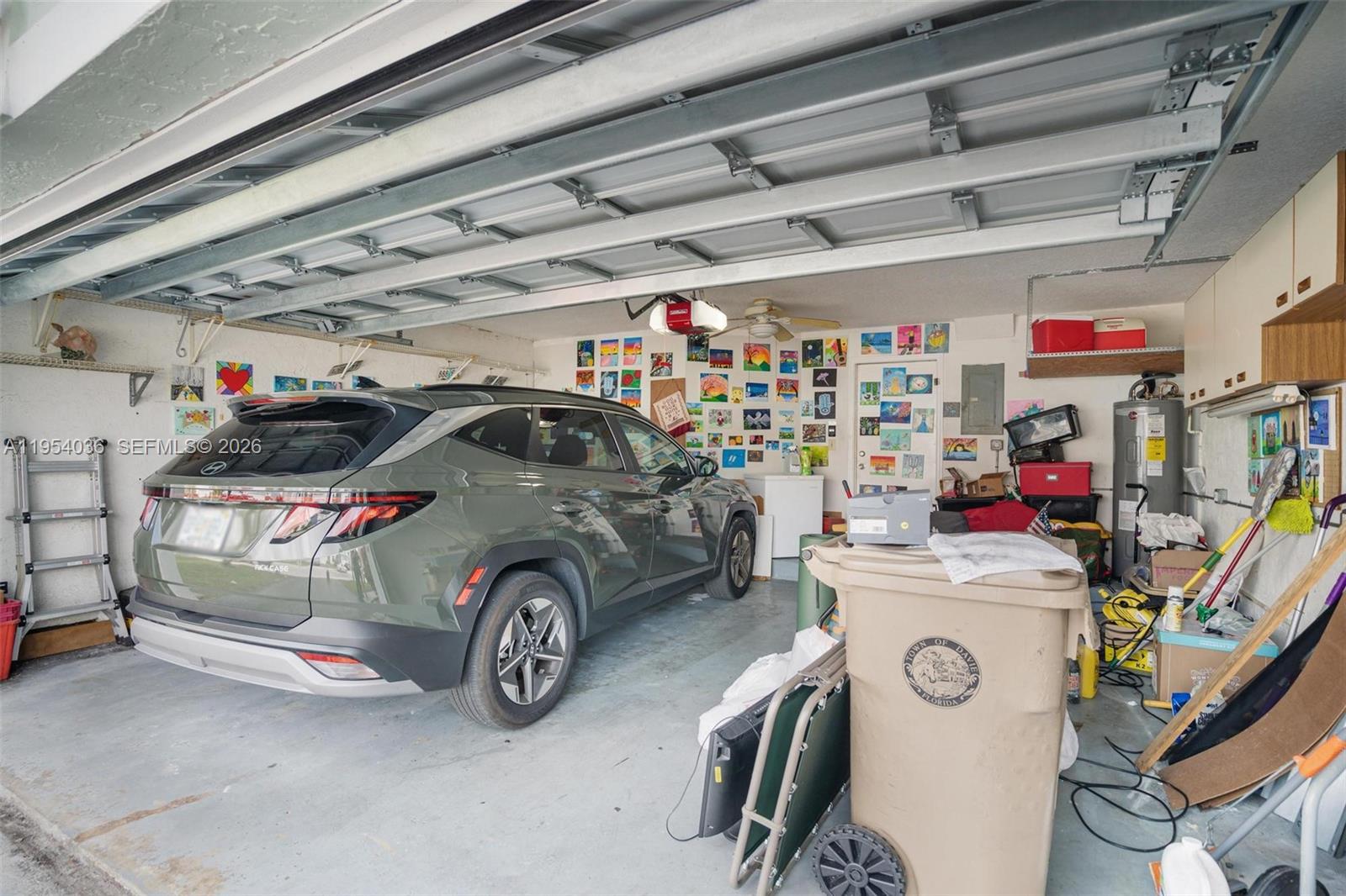 13930 Oak Ridge Drive Davie, FL 33325 - Photo 40 of 54 a car and bike parked