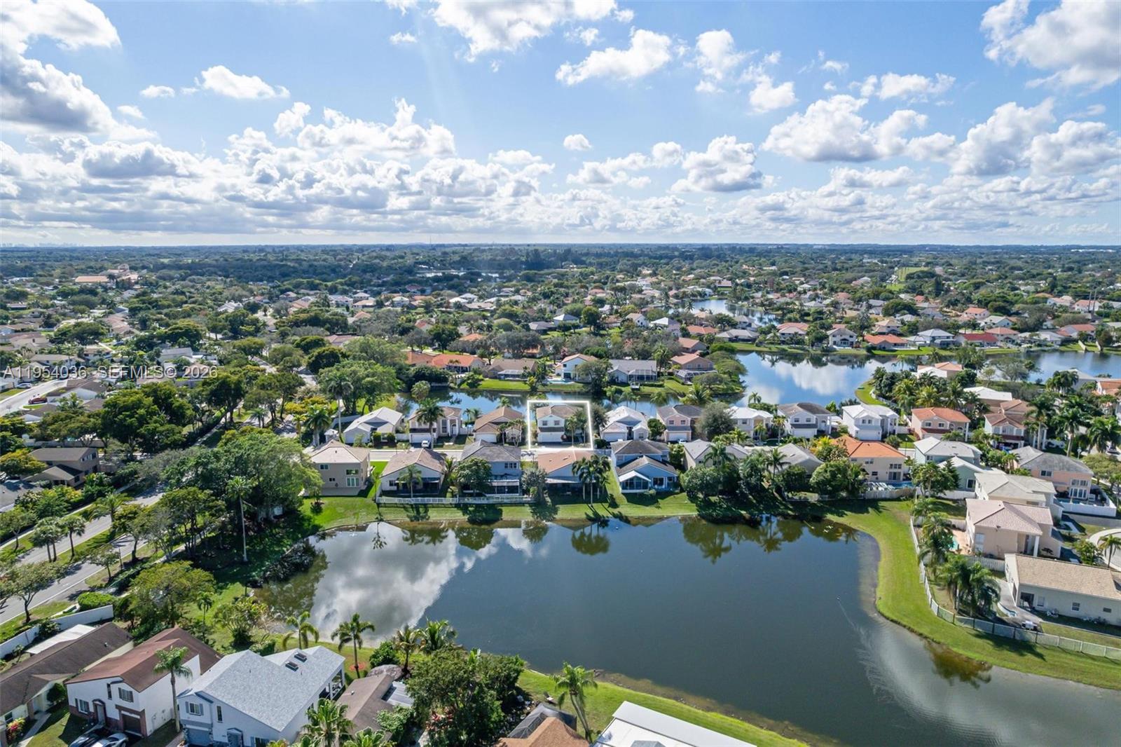 13930 Oak Ridge Drive Davie, FL 33325 - Photo 48 of 54 an aerial view of a city
