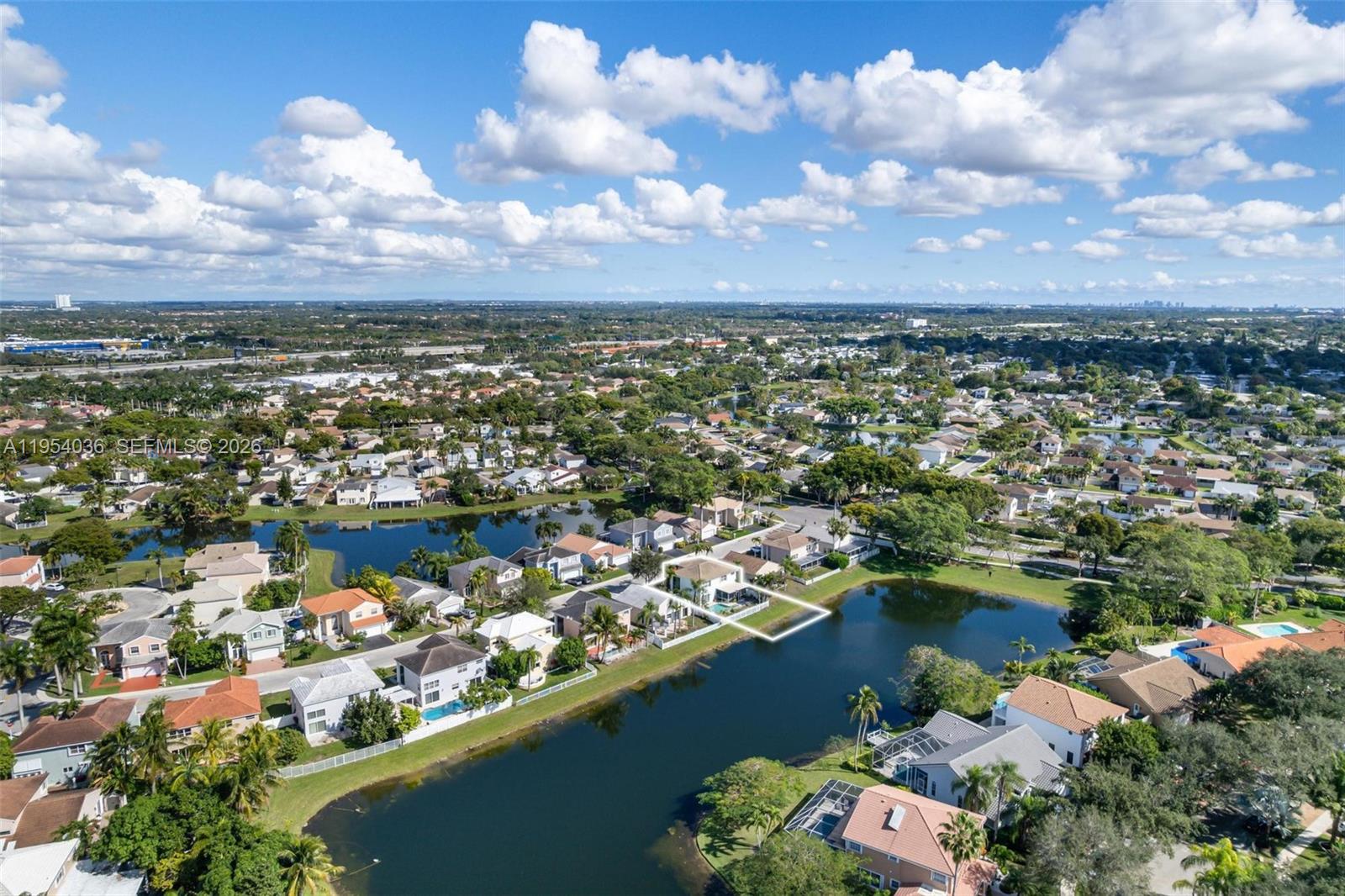 13930 Oak Ridge Drive Davie, FL 33325 - Photo 50 of 54 an aerial view of a city