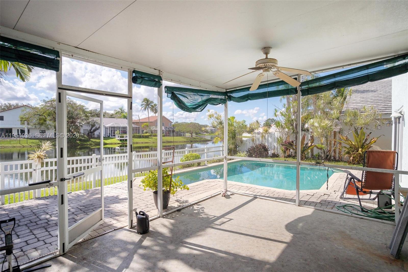 13930 Oak Ridge Drive Davie, FL 33325 - Photo 7 of 54 a view of swimming pool with a sitting area
