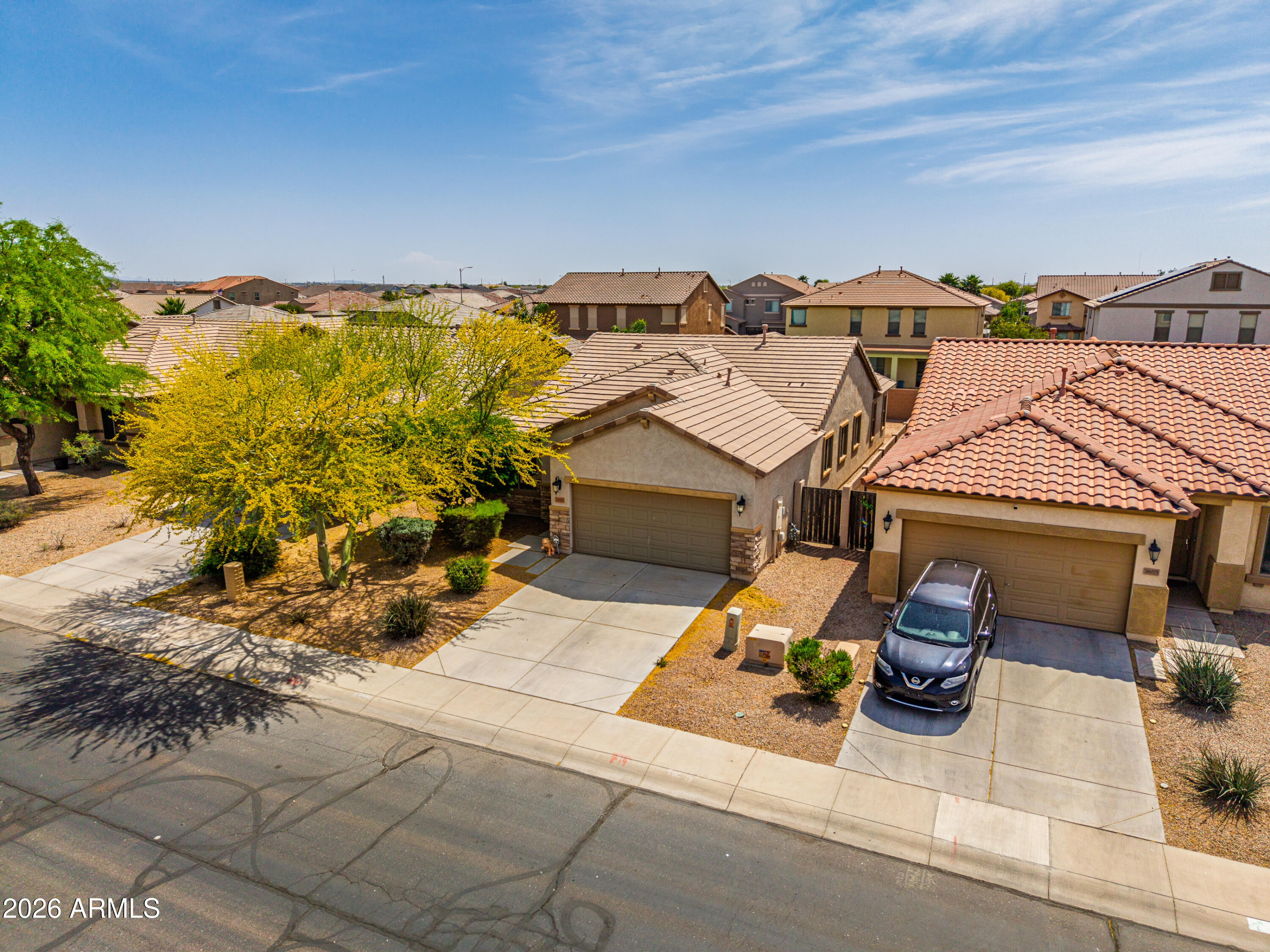 38061 West Merced Street Maricopa, AZ 85138 - Photo 10 of 49 an aerial view of a house with a yard