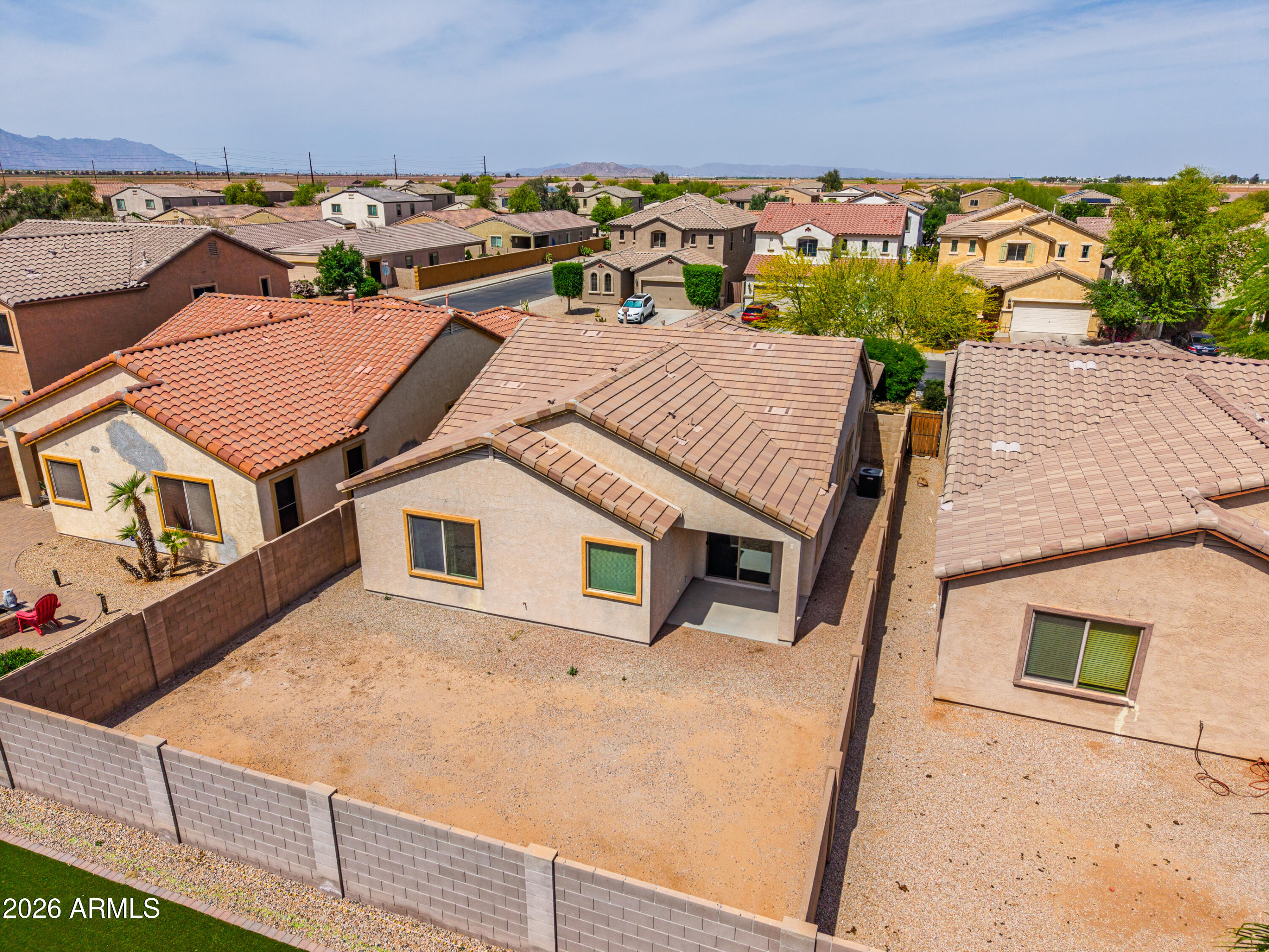 38061 West Merced Street Maricopa, AZ 85138 - Photo 39 of 49 an aerial view of a house with a yard
