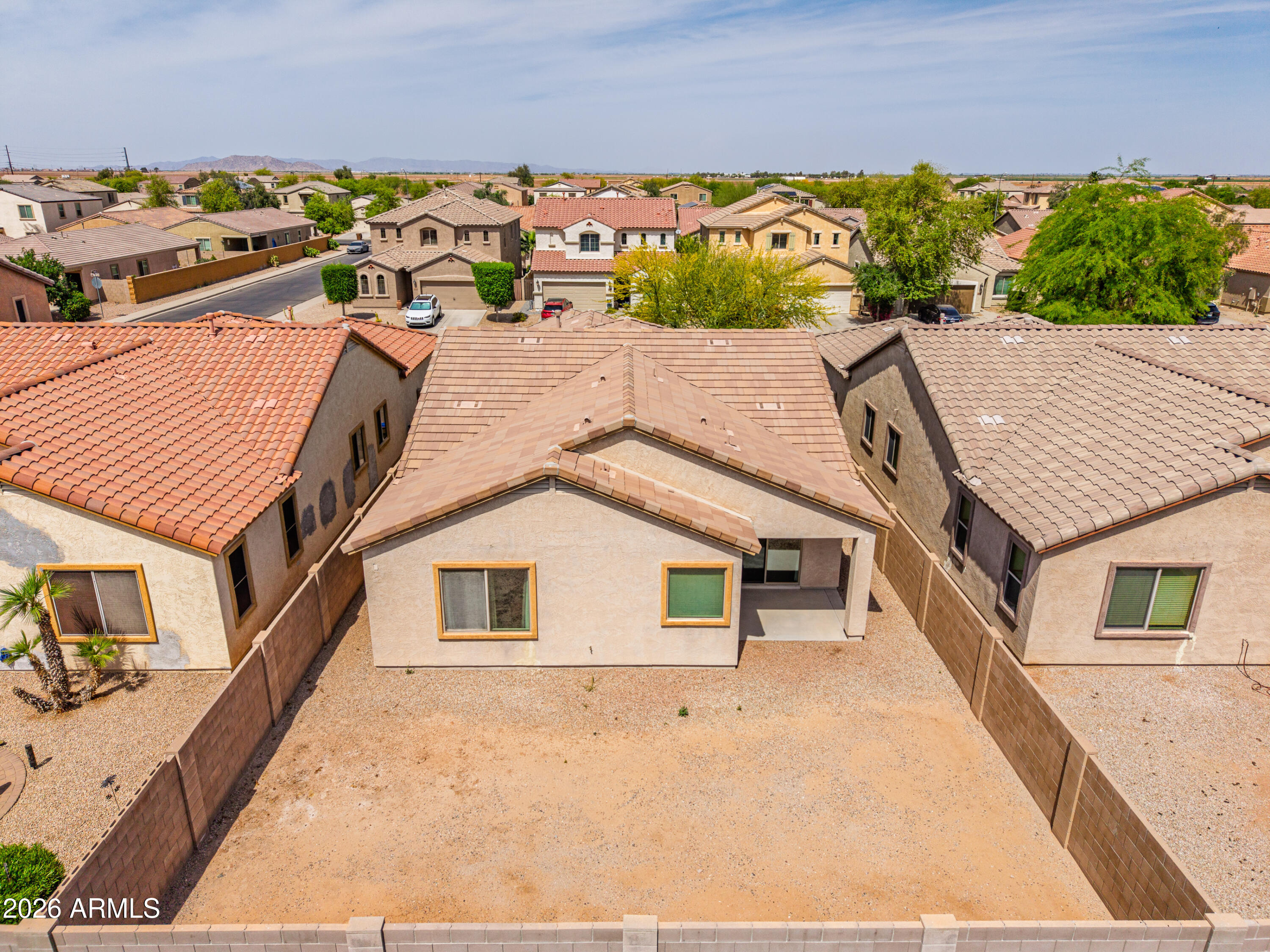 38061 West Merced Street Maricopa, AZ 85138 - Photo 40 of 49 a aerial view of a house with a yard