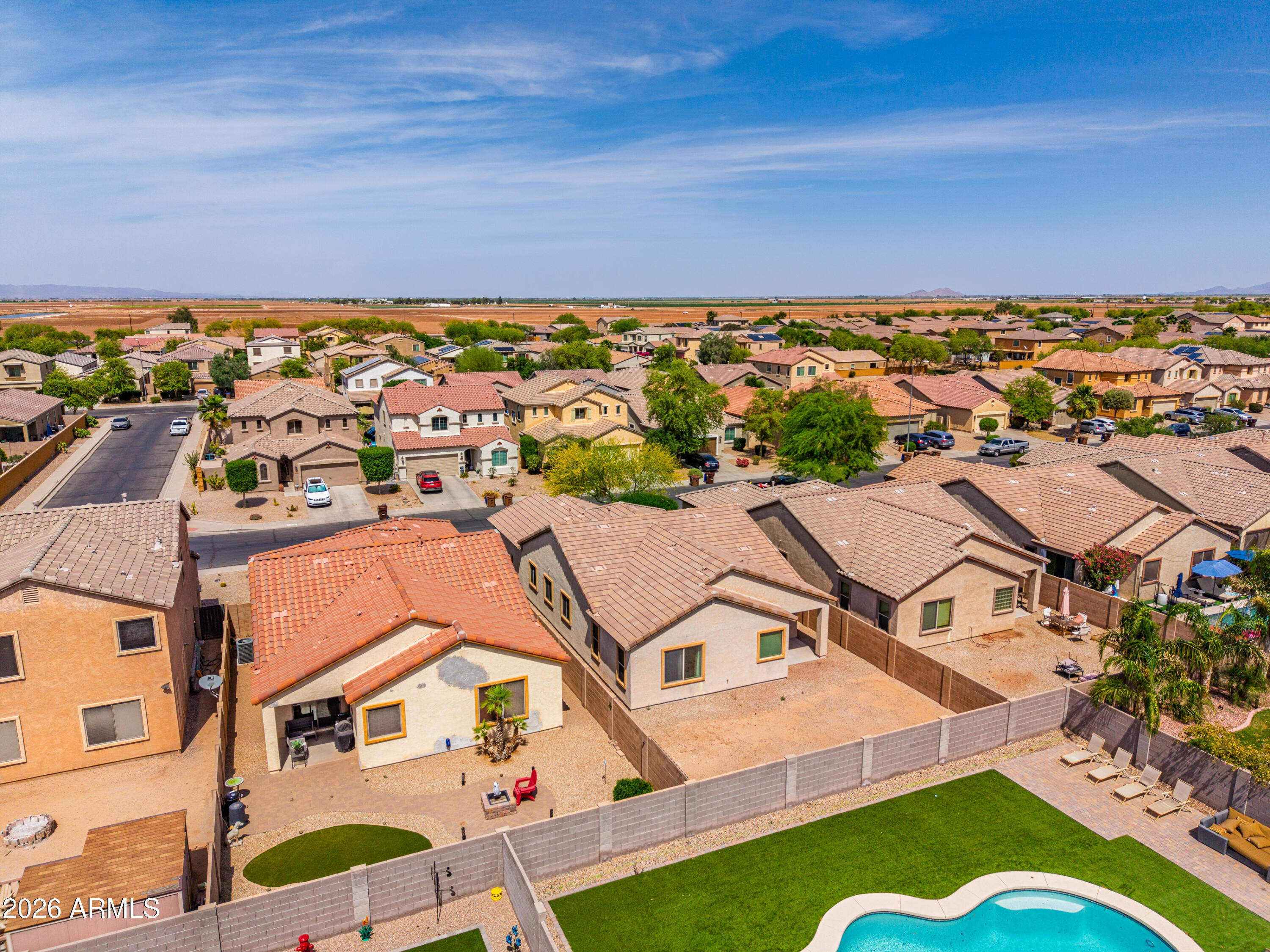 38061 West Merced Street Maricopa, AZ 85138 - Photo 42 of 49 an aerial view of residential houses with outdoor space